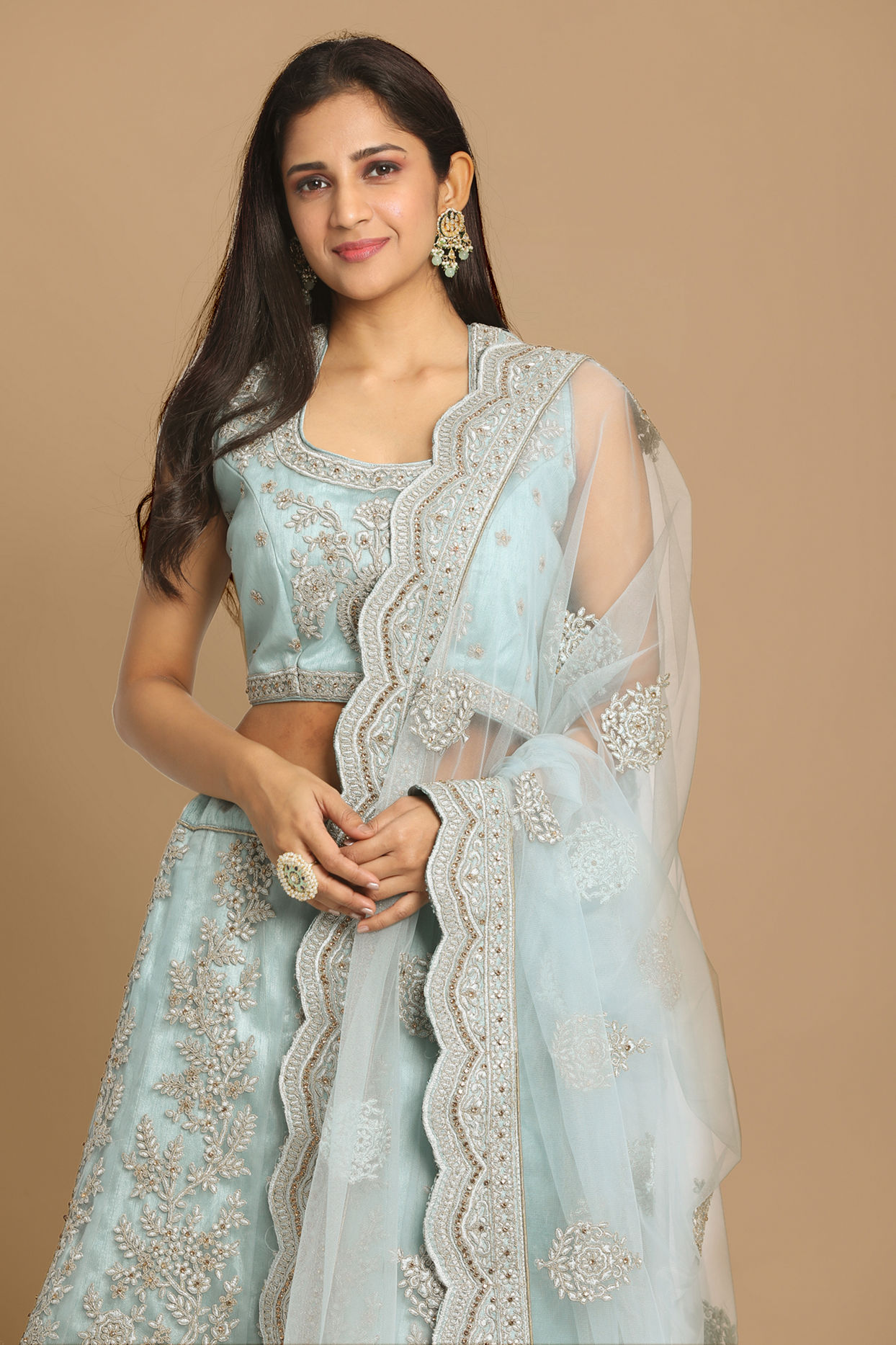 alt message - Mohey Women Graceful Light Blue Lehenga image number 1